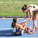 2016 Rio Olympics - Athletics - Preliminary - Women's 5000m Round 1 - Olympic Stadium - Rio de Janeiro, Brazil - 16/08/2016. Nikki Hamblin (NZL) of New Zealand stops to help Abbey D'Agostino (USA) of USA. REUTERS/Dylan Martinez FOR EDITORIAL USE ONLY. NOT FOR SALE FOR MARKETING OR ADVERTISING CAMPAIGNS. - RTX2L8F9